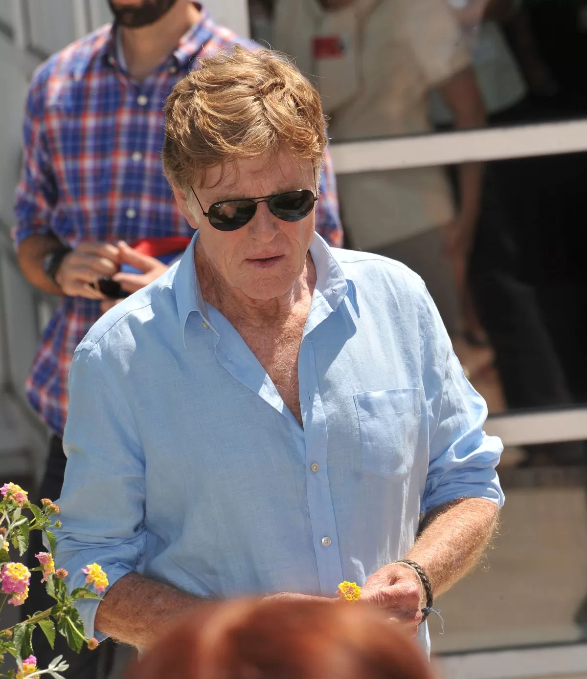 Robert Redford, cu ochelari de soare la ochi
